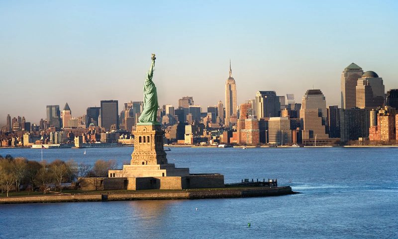 Statue of Liberty and New York skyline — study in USA
